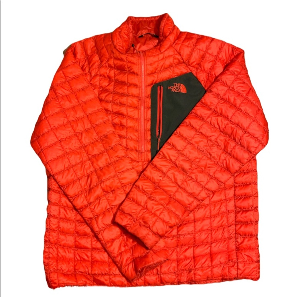 Red north face puff jacket.